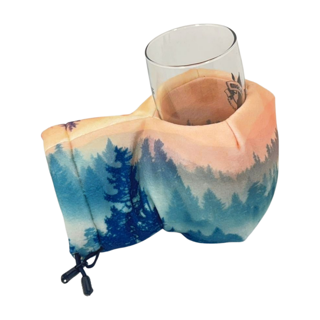 Bend Echo Ridge Giddyup Glove™ holding a glass – insulated hand and drink combo for hands-free sipping.