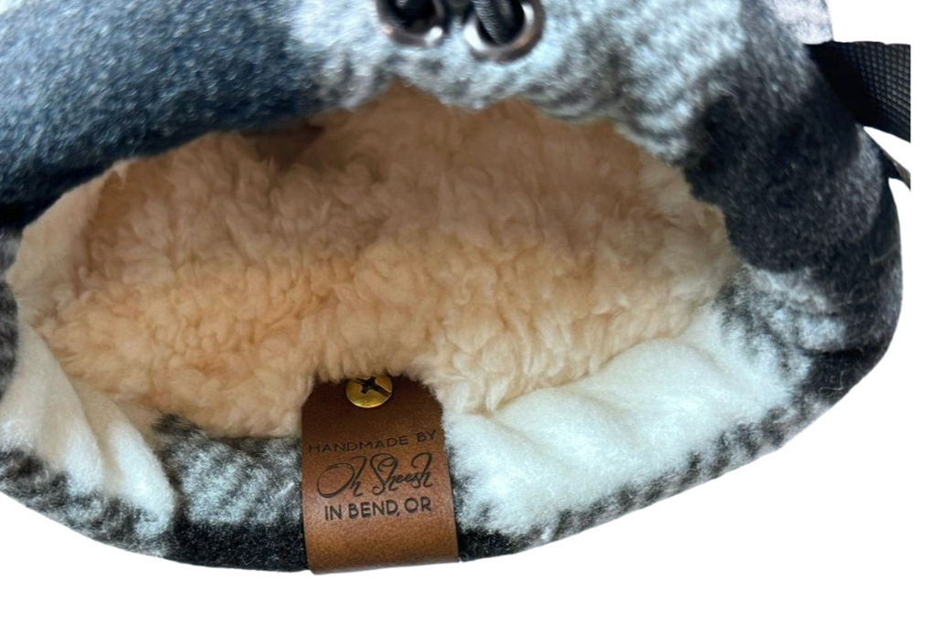 Open wrist view of Black and White Buffalo Plaid Giddyup Glove™, showing adjustable cuff and insulated hand compartment.