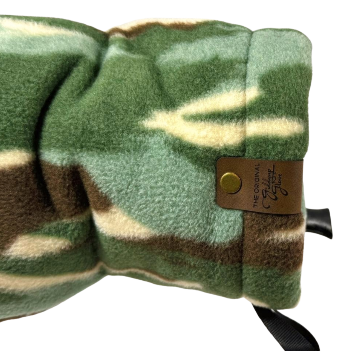 Camouflage Giddyup Glove™ close-up on left wrist, showcasing cozy insulated fit and durable construction.
