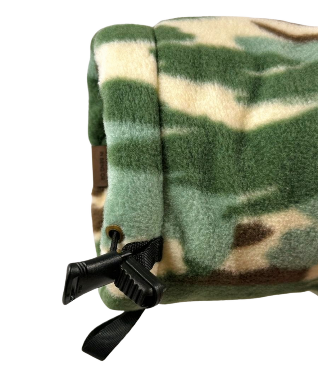 Camouflage Giddyup Glove™ close-up on right wrist, highlighting comfort, warmth, and flexible fit.