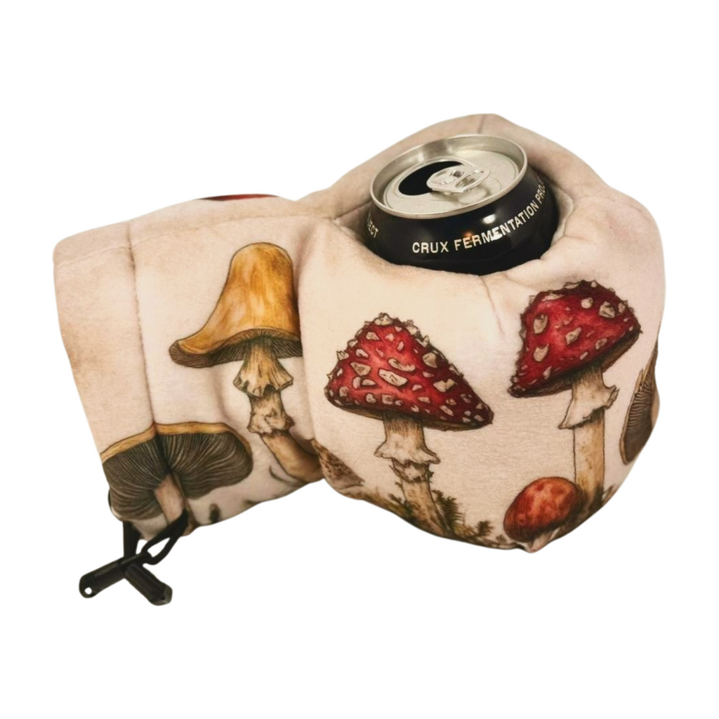 Fungipedia Giddyup Glove™ gripping hot or cold beverage, showing insulated drink-holding mitten in action