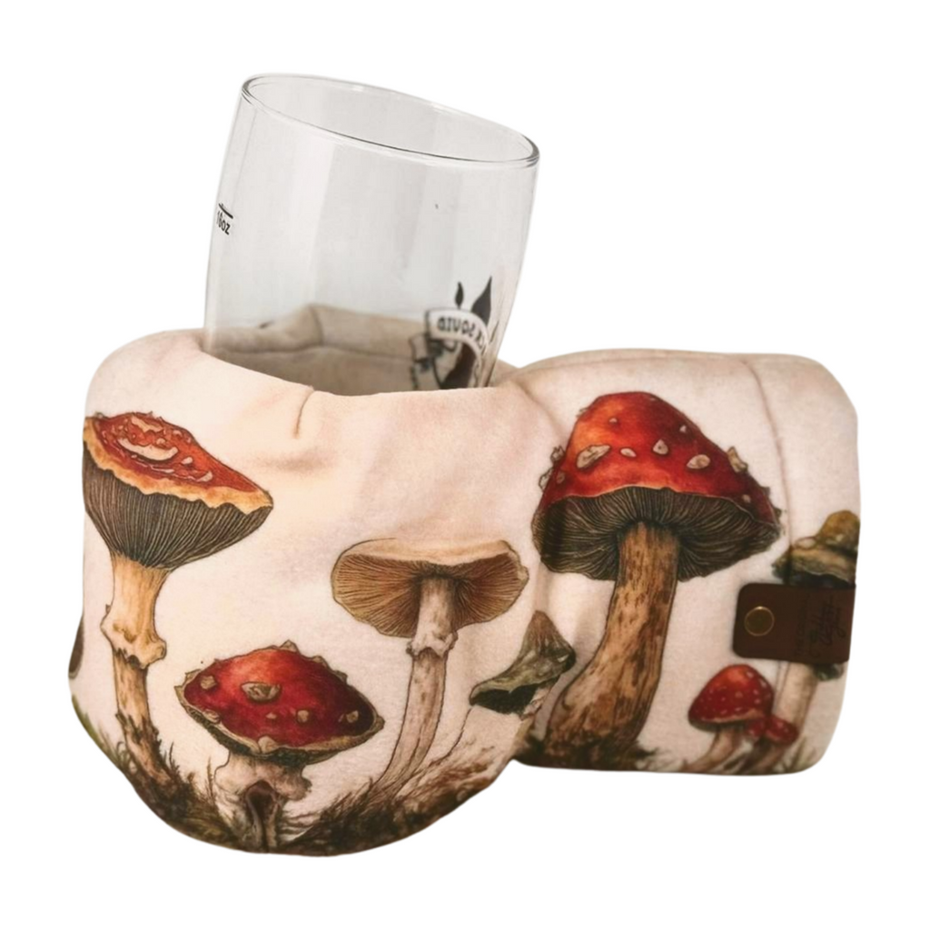 Fungipedia Giddyup Glove™ gripping hot or cold beverage, showing insulated drink-holding mitten in action