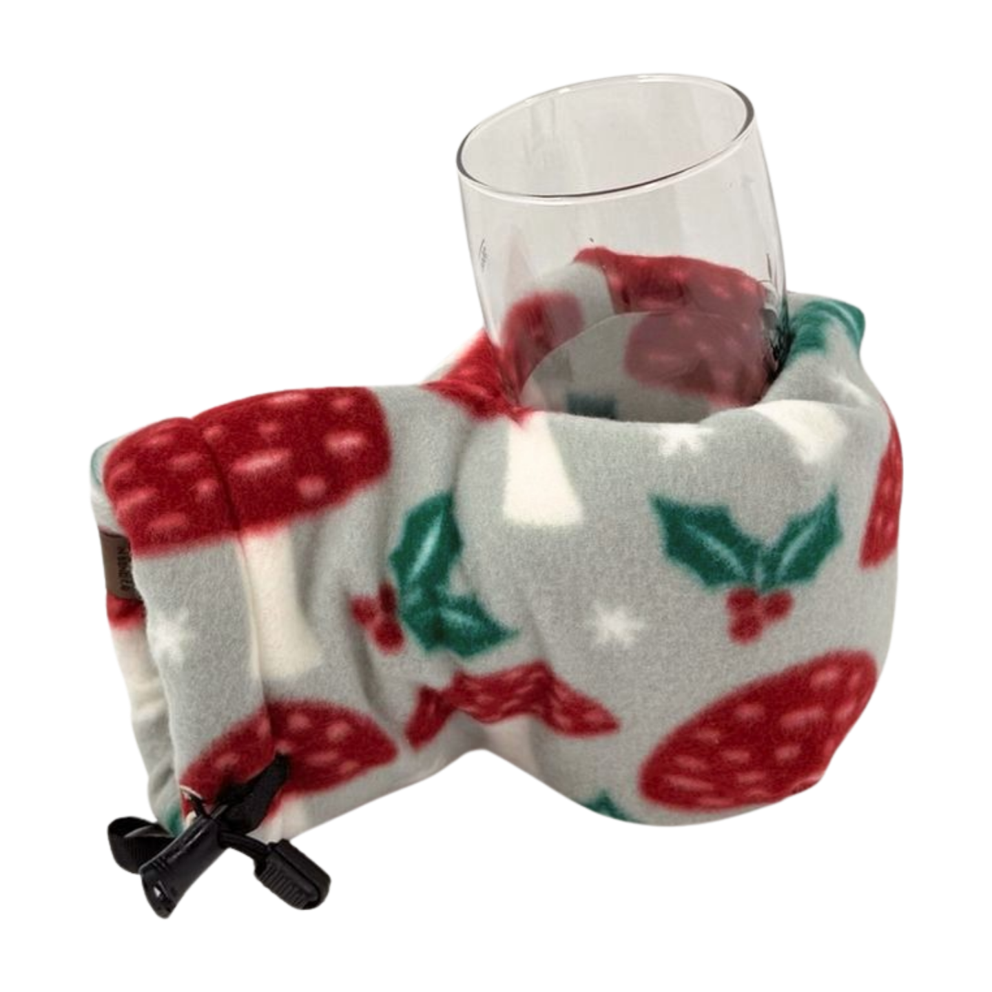 Top view of Funglow Mistletoe Giddyup Glove™ holding a glass for après-ski or sidelines