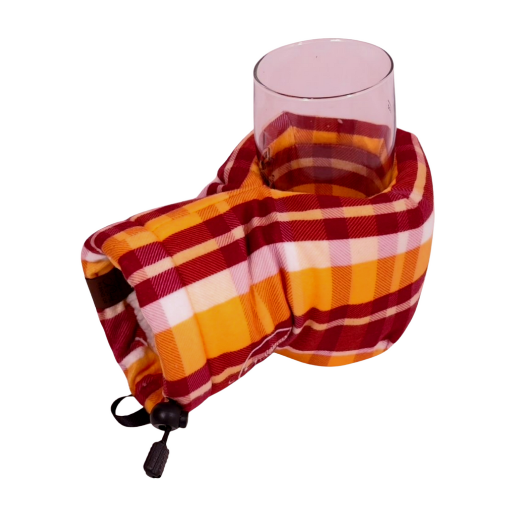 Golden Gate Gold Maroon Plaid Giddyup Glove™ holding a glass, ideal for cozy outdoor or indoor sipping.