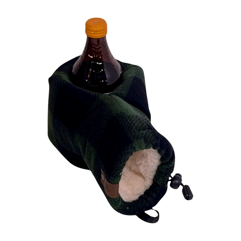Green and black buffalo plaid Giddyup Glove™ in dark fleece holding a bottle, cozy winter glove.