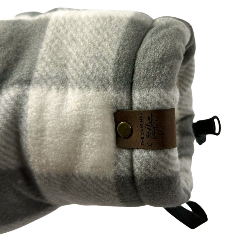 Close-up of Grey and White Buffalo Plaid Giddyup Glove™ wrist strap and insulated cuff for sidelines or outdoor use