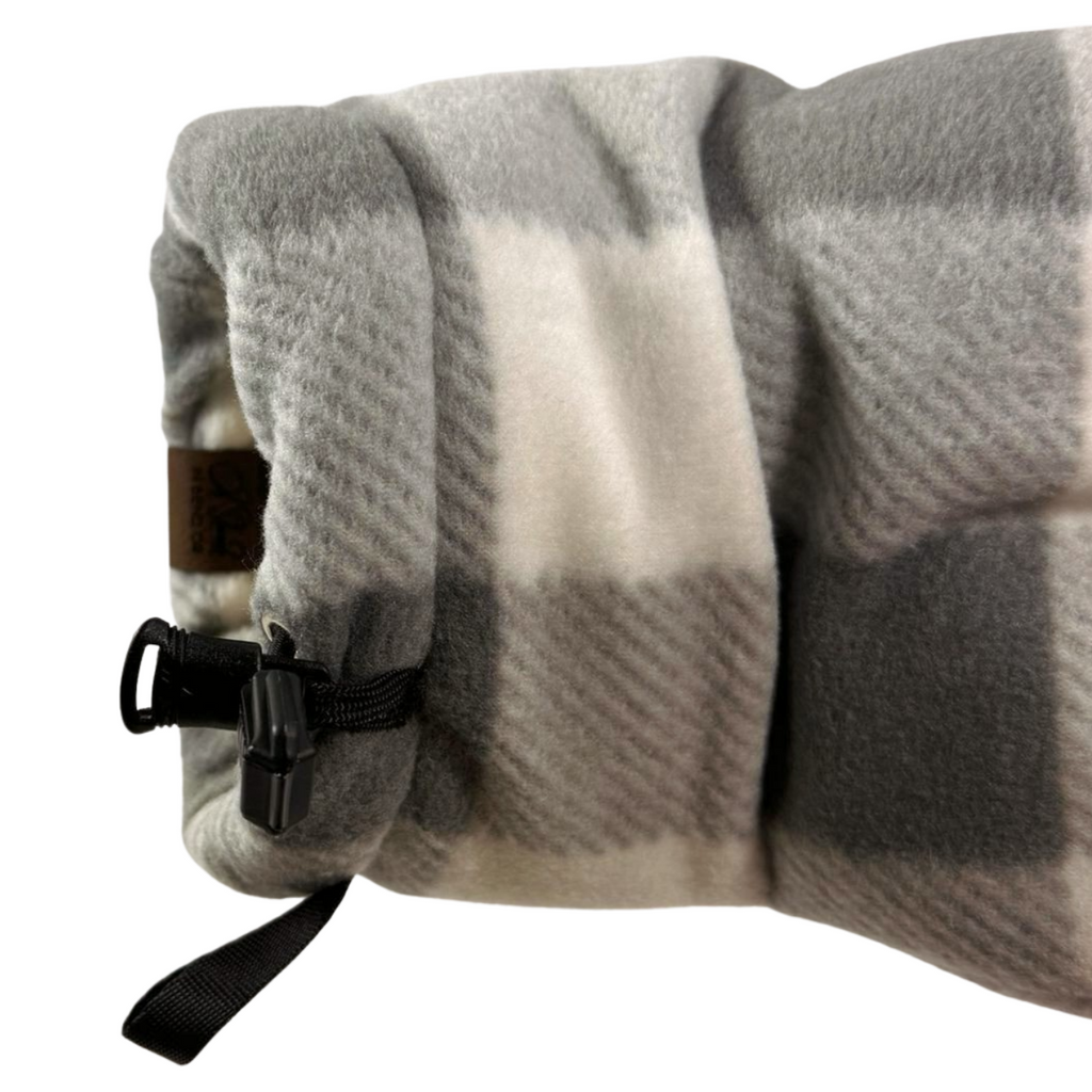 Close-up of Grey and White Buffalo Plaid Giddyup Glove™ wrist strap and insulated cuff for sidelines or outdoor use