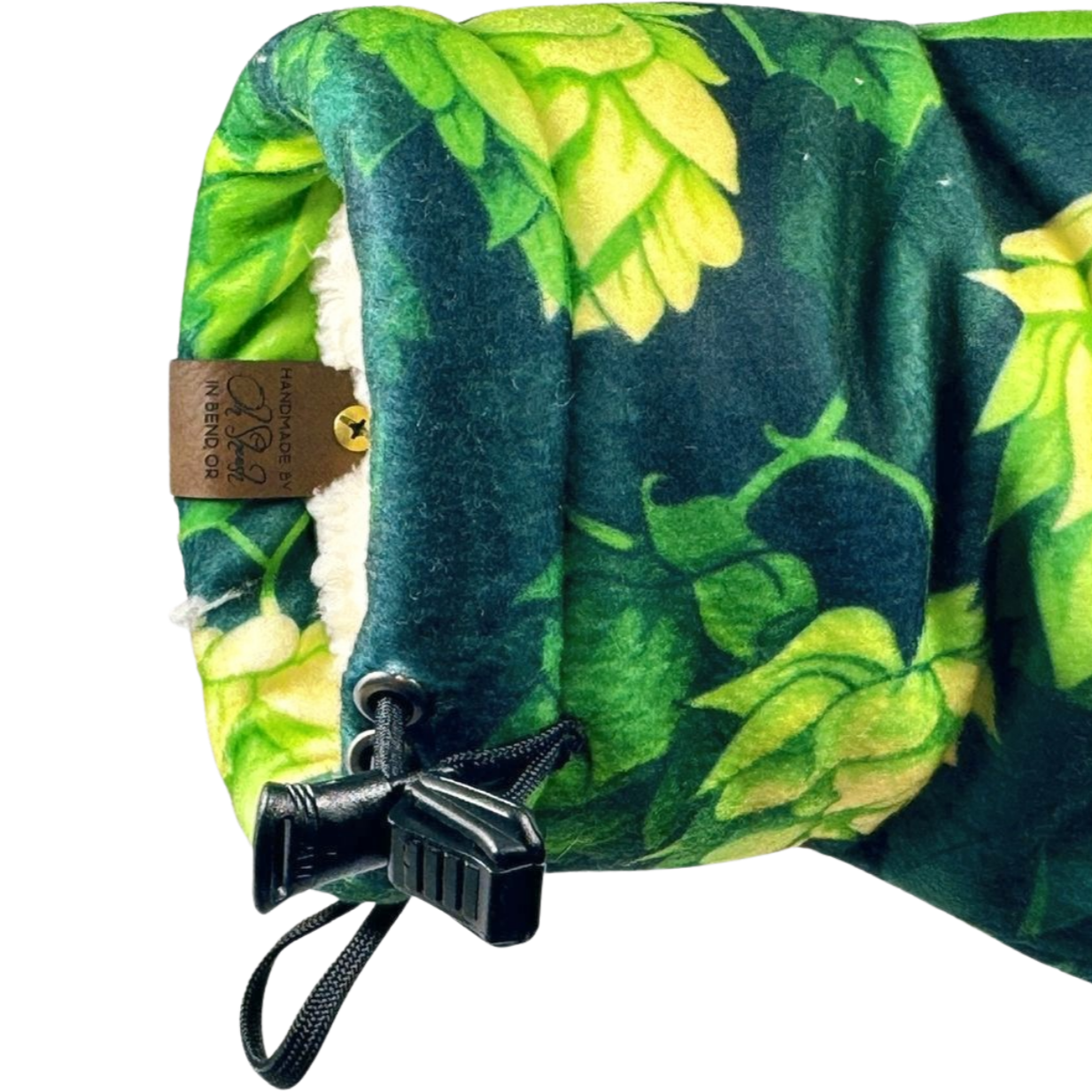 Close-up of Hoptimist Giddyup Glove™ wrist strap and insulated cuff for sidelines or cold weather activities