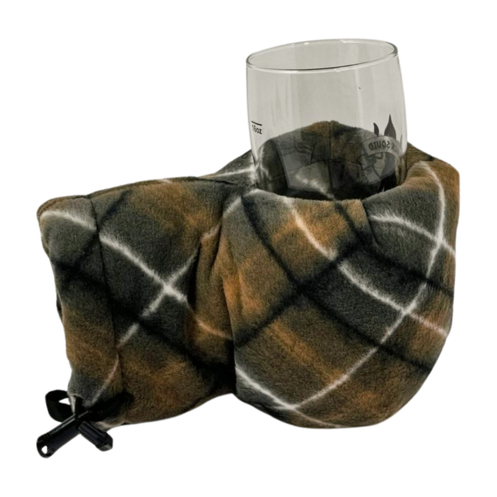 Picnic in the Snow Giddyup Glove™ holding a glass, showcasing versatile use for winter beverages.