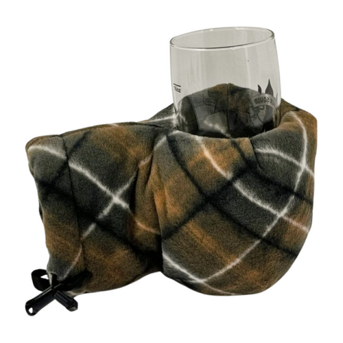 Top view of Picnic in the Snow Giddyup Glove™ holding a glass for après-ski or sidelines