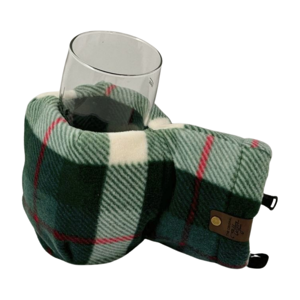 Top view of Plaid Tidings Giddyup Glove™ holding a glass for après-ski or sidelines