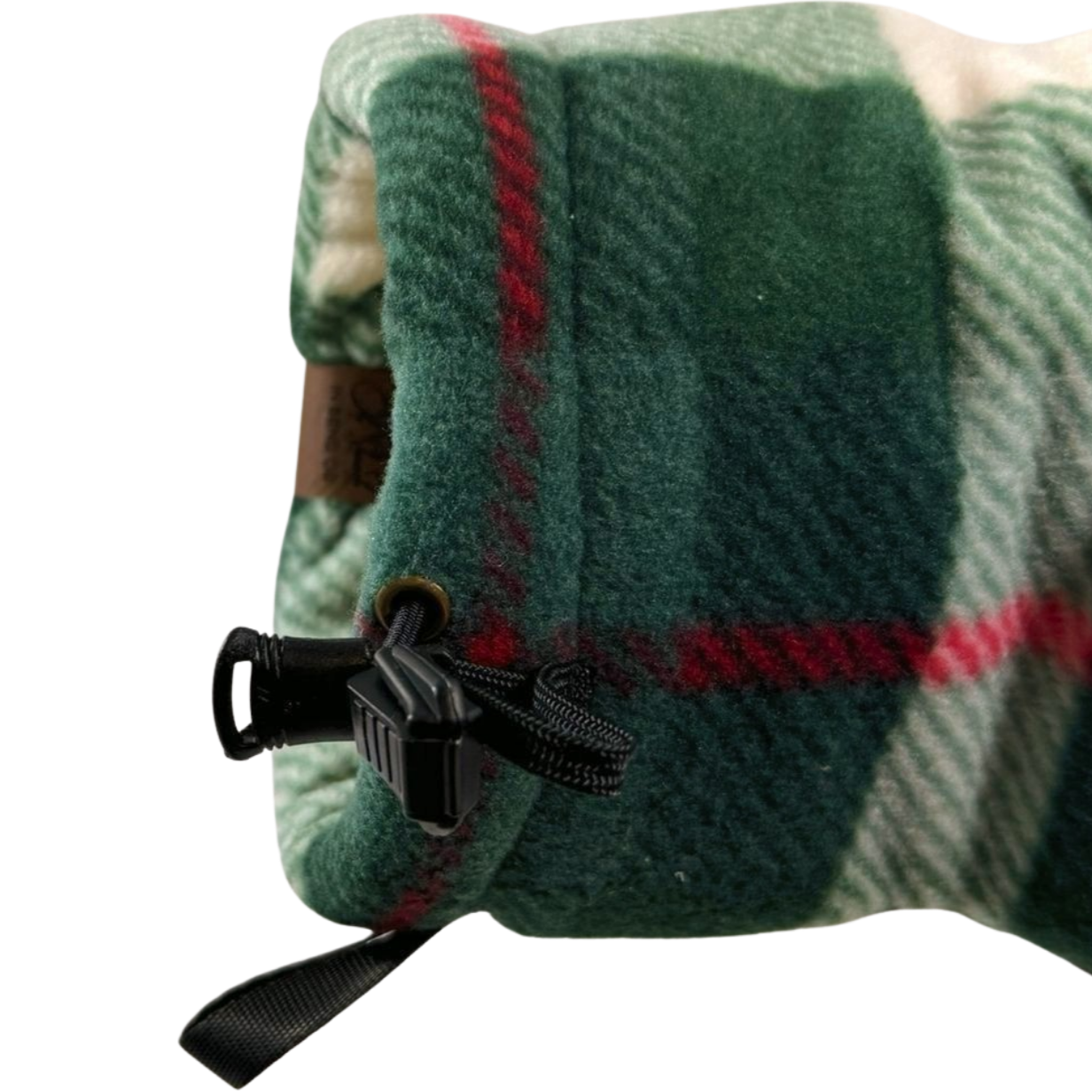 Close-up of Plaid Tidings Giddyup Glove™ wrist strap and insulated cuff for sidelines or outdoor use